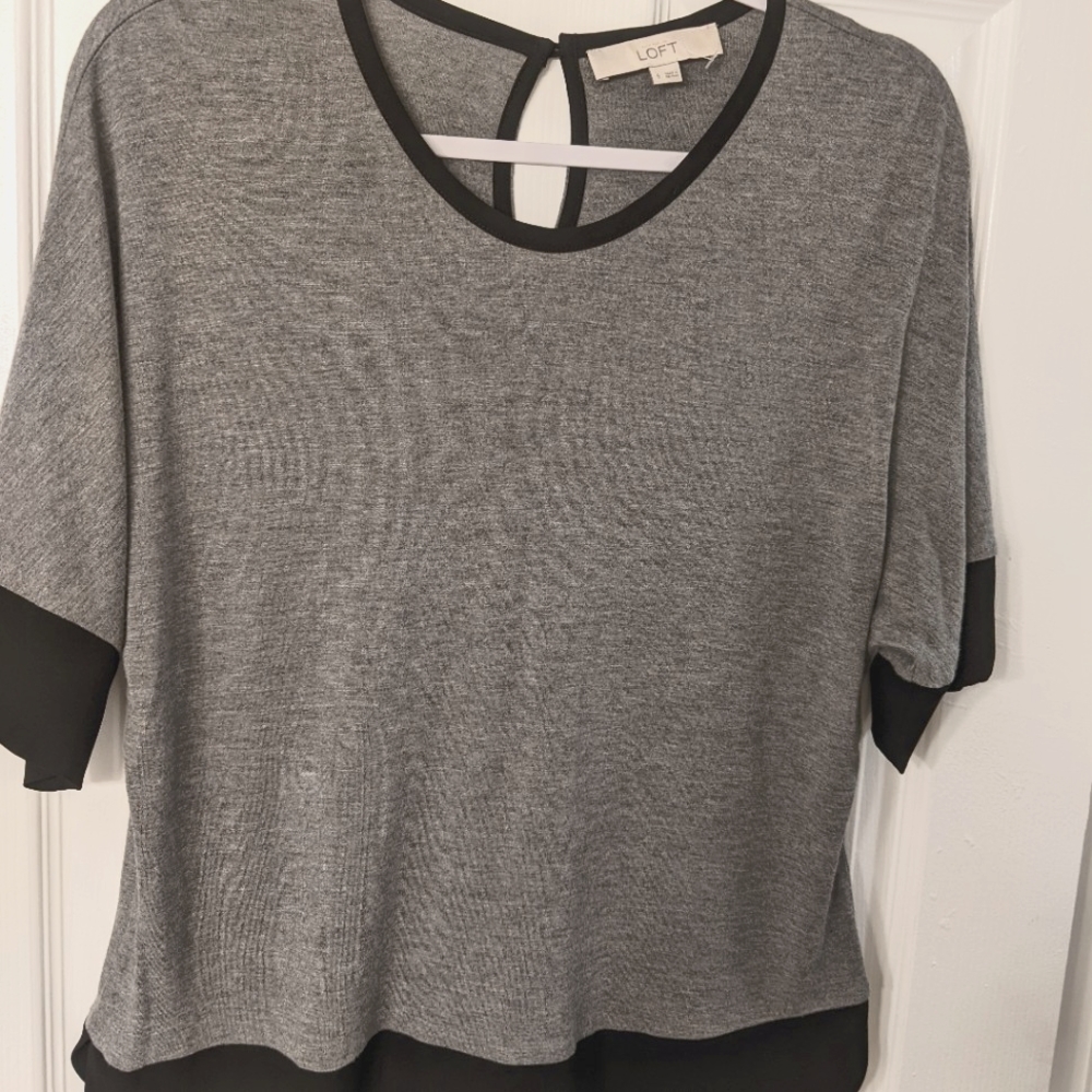 Size small gray shirt with black sleeves